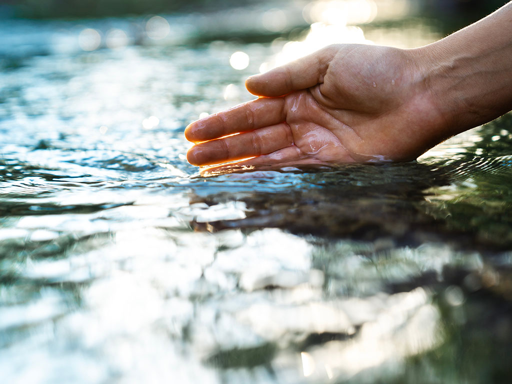 Hand in water